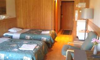 Отель Hotel Tulikettu Соткамо Стандартный двухместный номер с 2 отдельными кроватями-3